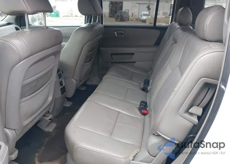 2009 Honda Pilot Touring z USA, uszkodzony, nr VIN 5FNYF48959B053187